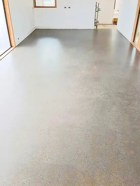Speckled flake floor finished in a finished basement room